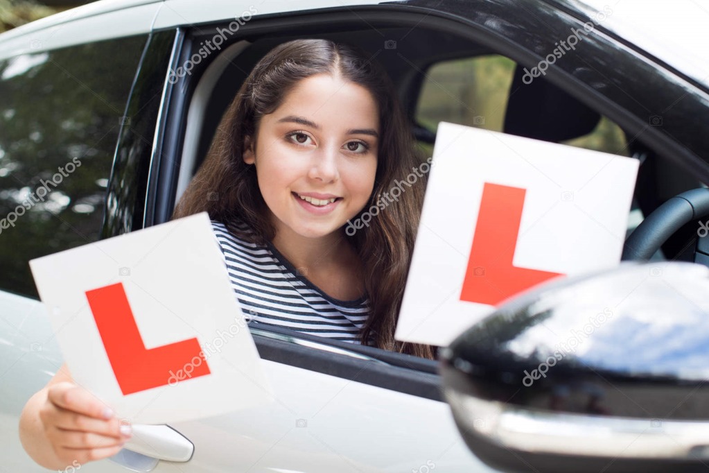 depositphotos_206544294-stock-photo-portrait-teenage-girl-passing-driving